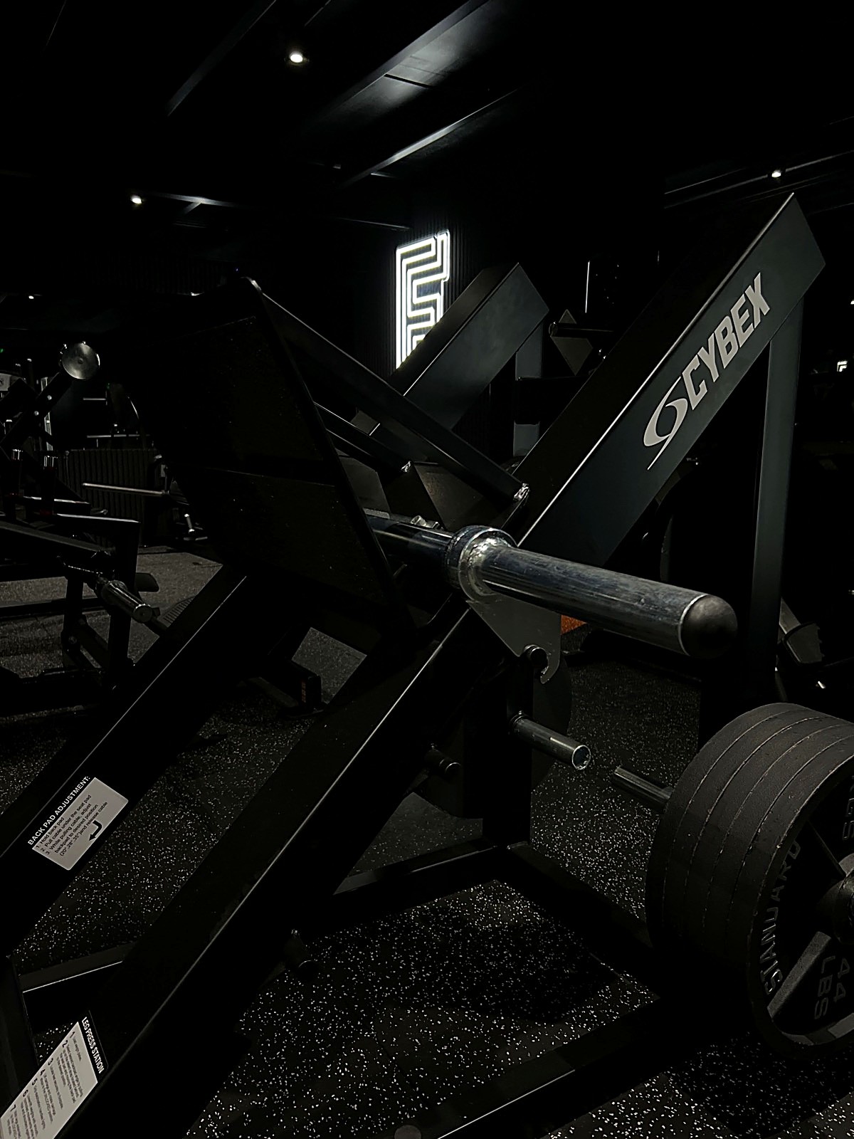 A Cybex machine on the FORTIS floor under the neon F